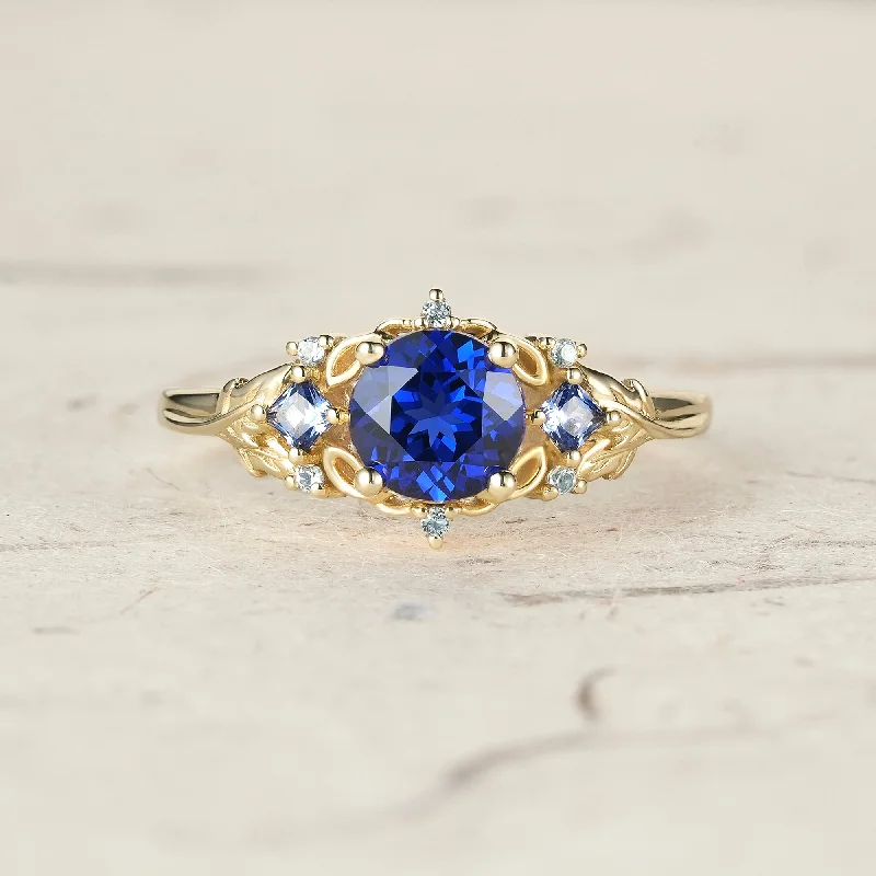 Men's Ruby Engagement Rings in Rose Gold with a Solitaire Design for a Romantic GestureThree Stone Royal Blue Sapphire Engagement Ring - Estelle