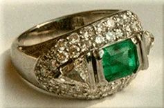 Men's Sapphire Engagement Rings in 18K White Gold with Pave Diamond AccentsEmerald cut Emerald with Trillion Diamonds